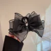 women's retro black bow grip clip